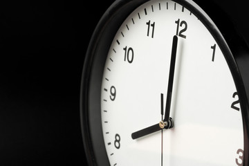 Alarm clock close up on black background