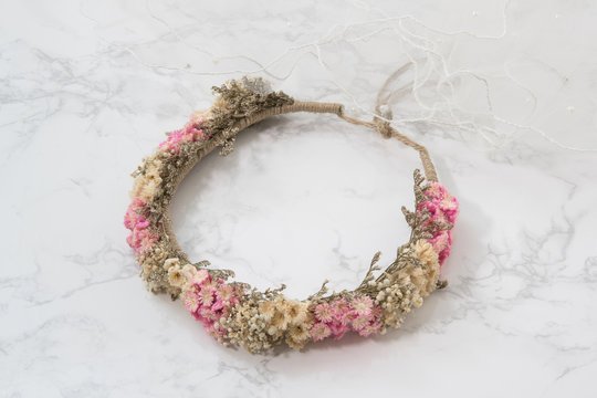 Flower Headband On White Marble Background