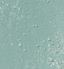 Drops of water on a blue glass window