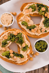 Friselle with turnip tops and hummus.