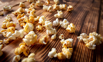 Popcorn flakes on a wooden background