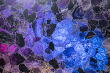 Close up shot of granite texture. Transparent granite allow light shine through. Interior material