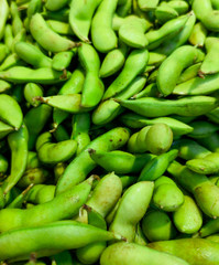 Green beans on the market as a background