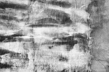 Texture of a concrete wall with cracks and scratches which can be used as a background