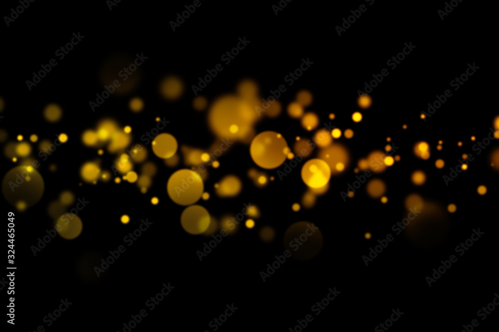 Poster golden light bokeh and abstract glittering on dark background. sparkling dust particles.