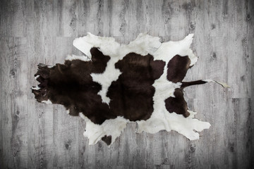 carpet made of cow skin on wood like laminade floor