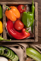 Color chili peppers with cucumber slices