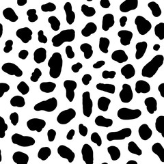Black spots on a white background. Animal print. Spots of a cow and dolmatins. Seamless pattern for fabric, for wallpaper, for paper, for plastic and other surfaces.