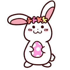 イースターエッグを持ったかわいいウサギ