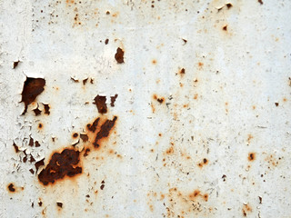 Rust stains on sheet metal.