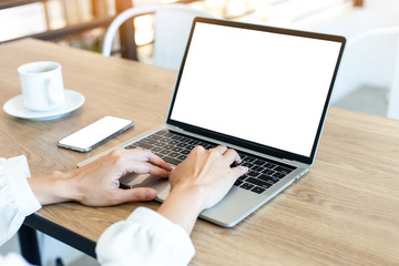 mockup image blank screen computer,cell phone with white background for advertising text,hand man using laptop texting mobile contact business search information on desk in office.marketing,design