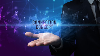 Elegant hand holding CONNECTION CONCEPT inscription, social networking concept