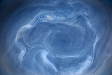 white and blue waves on the black background