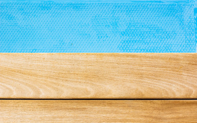 simple background wood material deck floor textured surface and classic blue water wallpaper patter mock up space for copy or your text