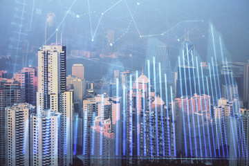 Fototapeta na wymiar Forex chart on cityscape with skyscrapers wallpaper double exposure. Financial research concept.