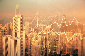 Forex chart on cityscape with skyscrapers wallpaper double exposure. Financial research concept.