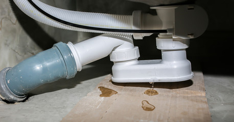 Bath installation. Testing tube leak. Drops of water. Maintenance repair in the flat. Renovation process.