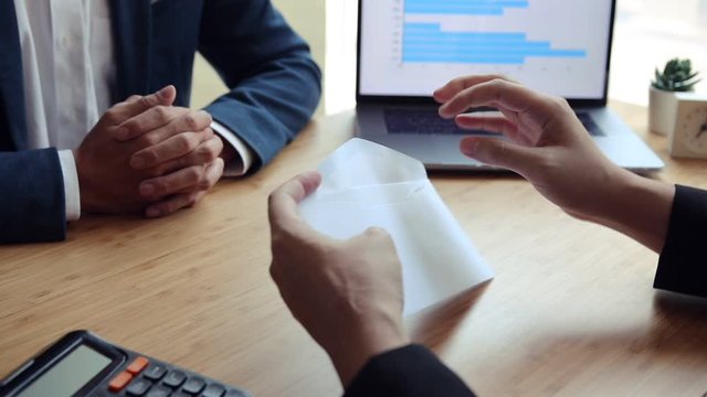 Male employee sent some envelopes to the employer while the employer opened the envelope. Found that the inside is an employee resignation letter.