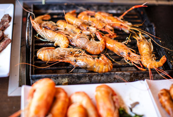 BBQ shrimp on grill at restaurant