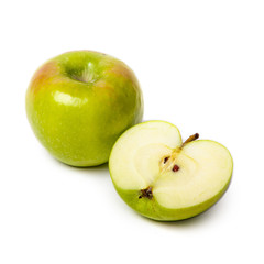 A sliced green apple isolated on white background