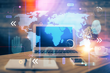 Multi exposure of table with computer and world map hologram. International data network concept.