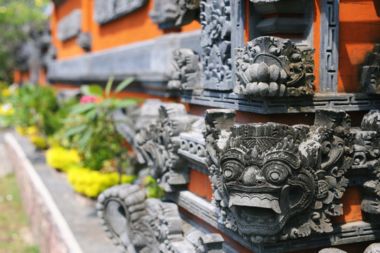 Traditional stone statues depicting demons, gods and Balinese mythological deities in Bali,Indonesia 