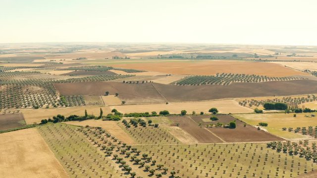 Aerial shot looking over fields in rural landscape