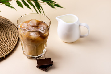 Cold Coffee Drink with Ice and Milk Iced Coffee Glass of Refreshing Summer Drink Copy Space