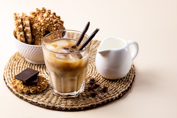 Cold Coffee Drink with Ice and Milk Iced Black Coffee and Cookies Glass of Refreshing Summer Drink Copy Space