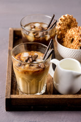 Two Glass of Tasty Cold Coffee on Wooden Tray Refreshing Cold Summer Drink Vertical