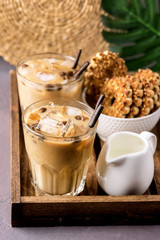 Two Glass of Tasty Cold Coffee on Wooden Tray Refreshing Cold Summer Drink Vertical