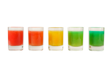 Multicolored opaque cocktails, a set of shots in one row, five servings. Side view Isolated white...