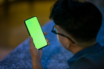 man use green screen phone