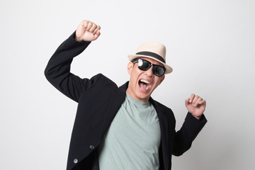 Portrait of an very happy adult asian man  in sunglasses.