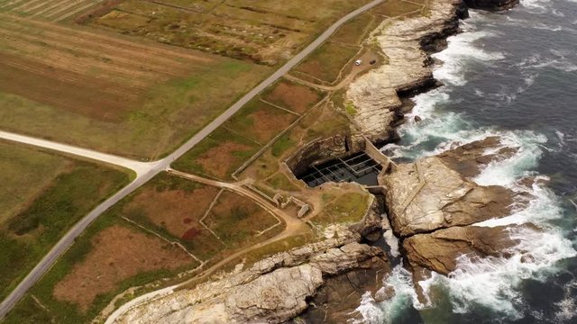 Aerial circling over indented coast of Rinlo in Galicia, Spain