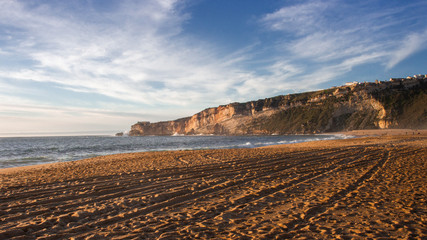 Sunset at the beautiful beach in Nazar&eacute;, Portugal