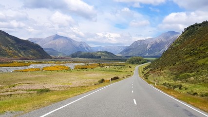 Empty road at Arthurs pass in New Zealand alps