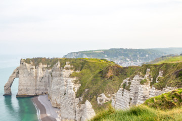 Fototapeta premium Rocks on the coast of the English channel strait. Etretat village, Normandy region, France.