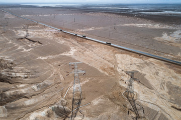 Fototapeta na wymiar aerial view of desert road in northwest of China