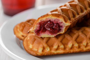 Close-up on waffle pops with cherry filling