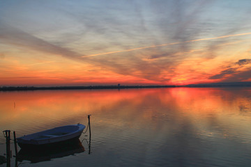 Amazing sunset in the natural Mejean lagoon, a protected wetland in Montpellier, France