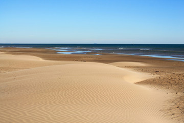 Fototapeta na wymiar The Amazing sandy beach in Gruissan in the Aude department, France