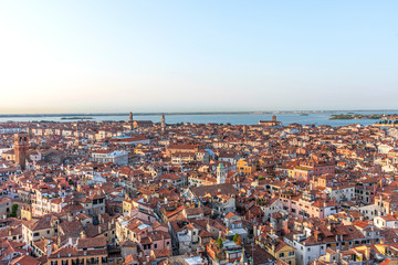 Picturesque panoramic view of Venice, Italy. Aerial scenery view with red roofs of houses.