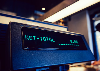 Cashier counter Net total payment at shop retail Business concept