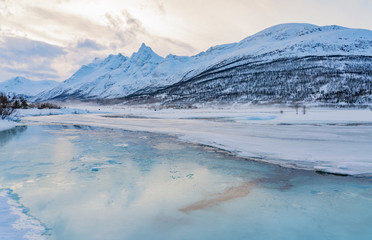 icy winter landscape in the Lyngen Alps, Finnmark in northern Norway north of the polar circle