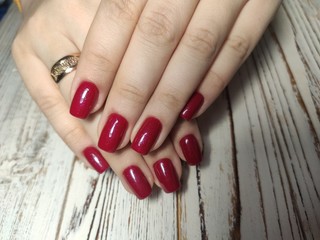beautiful gel lacquer manicure on a textured background