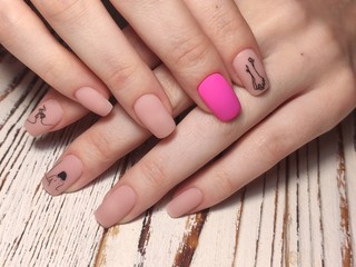 fashion manicure of nails on a beautiful textural