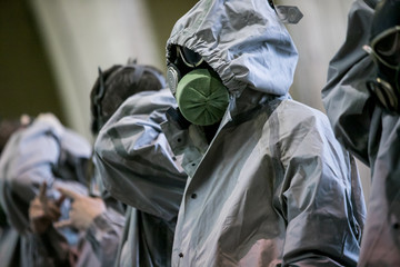 Man with protective mask and protective clothes, coronavirus protection