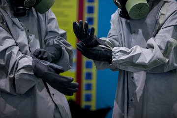 Man with protective mask and protective clothes, coronavirus protection