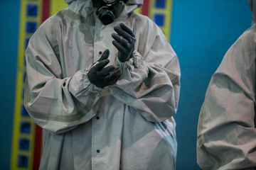 Man with protective mask and protective clothes, coronavirus protection